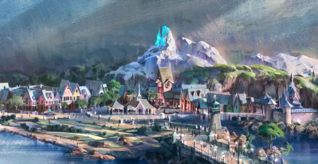 Concept art da nova área Frozen na Disneyland Paris mostrando a vila de Arendelle à beira do lago, com montanhas nevadas ao fundo e arquitetura inspirada no filme Frozen
