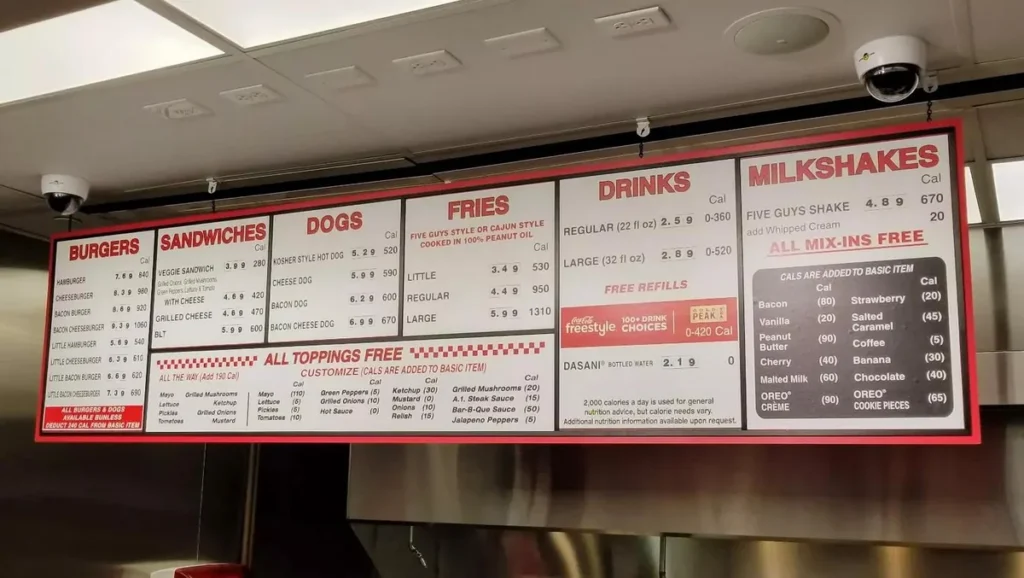 Menu do Five Guys Orlando com preços e opções de hambúrgueres, batatas e shakes
