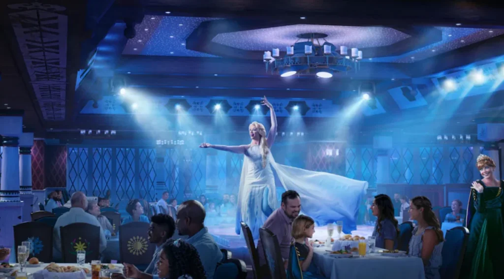 Restaurante temático Frozen no Disney Wish com Elsa se apresentando para os hóspedes.